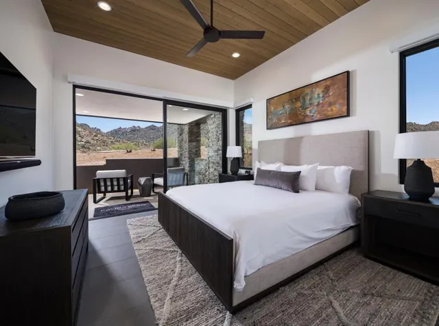 King bedroom with glass doors to the terrace
