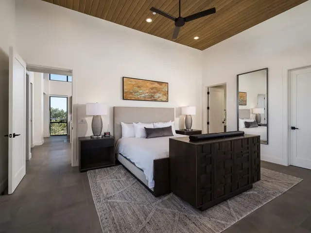 Bedroom with a reading bench and desert art